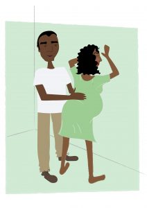 Image of Woman leaning against the wall with birth partner - copyright New Life Classes