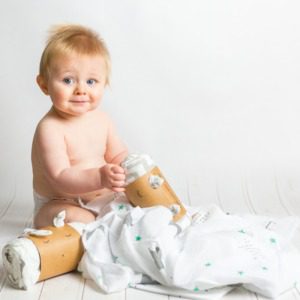 Photo of baby and New Life Style breastfeeding swaddle blankets